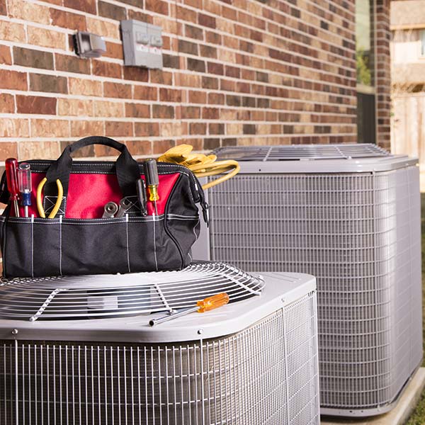 Service Industry: Work tools, air conditioners. Outside residential home. Summer