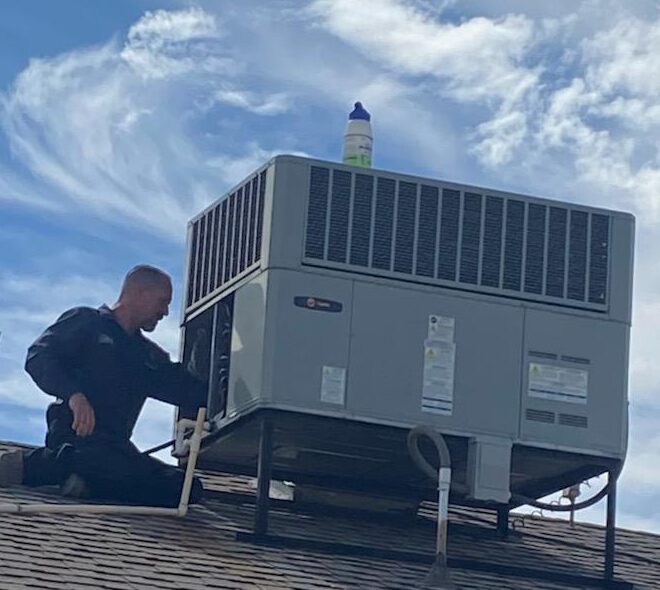 Meadow Air working on HVAC system