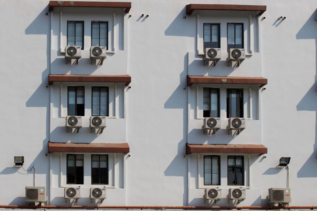 the air conditioners on the hotel wall